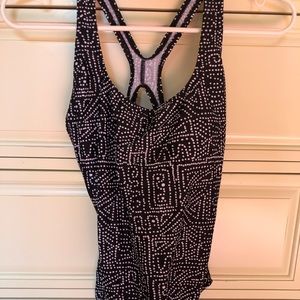New Speedo black and white one-piece bathing suit.